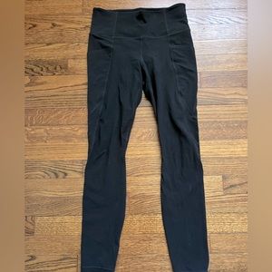 Athleta Salutation Stash Pocket black Tights leggings S